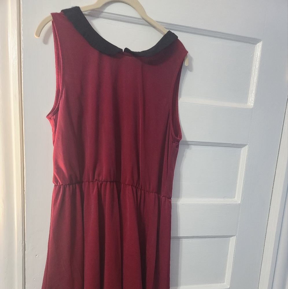 Divided brand maroon sleeveless dress with Peter pan collar. Size us 10. High lo